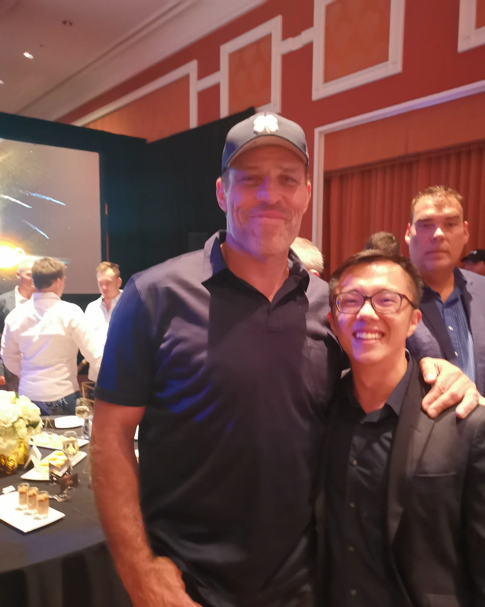 Marc with Tony Robbins, portrait crop
